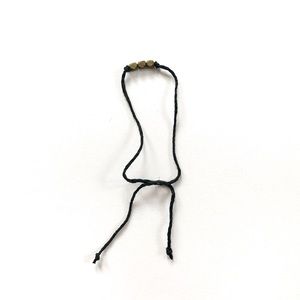 String Bracelet with Gold Beads